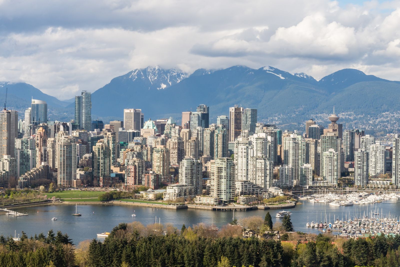 Vancouver skyline with mountains behind the marina